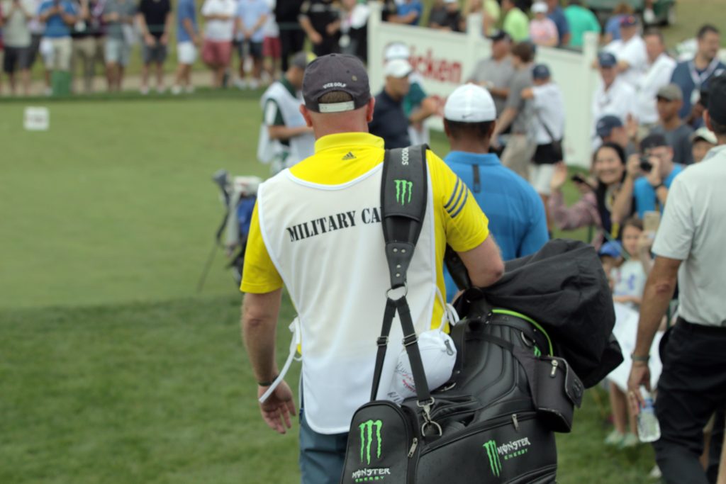 Tiger Woods with his Military Caddie